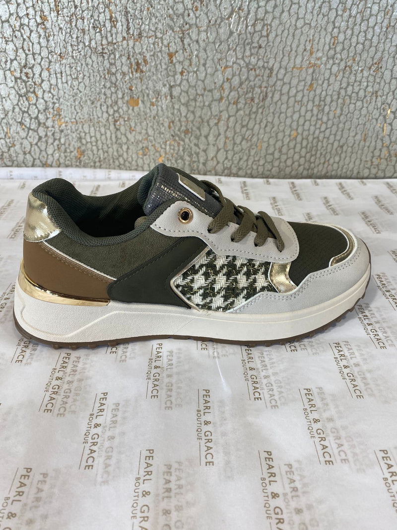 Green trainers with dog tooth detail